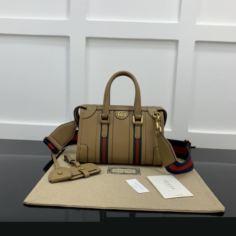 G*u*i top handle bags